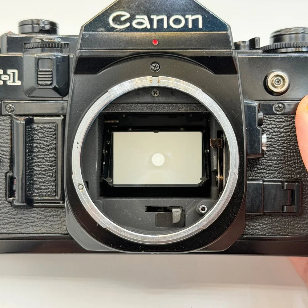 Canon A-1 35mm Film SLR Camera with FD 50mm 1:1.8 Lens, Filter, Cap Black TESTED